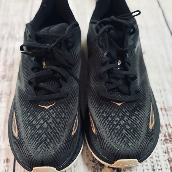 Hoka One One Black and Copper Athletic Shoes - Picture 2 of 9